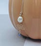 Freshwater pearl and tanzanite pendant with sterling silver wire zigzag - Image 1