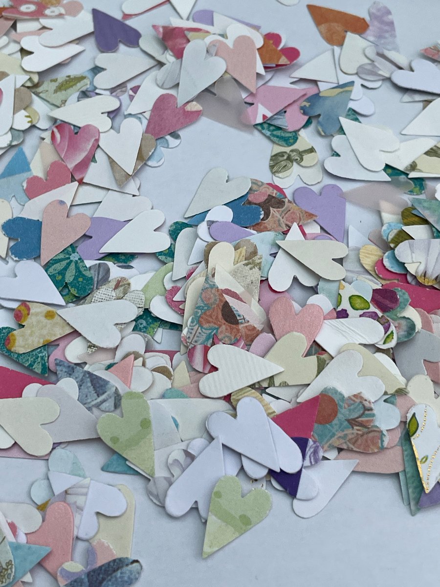 Hand punched paper hearts pretty summer colours table confetti