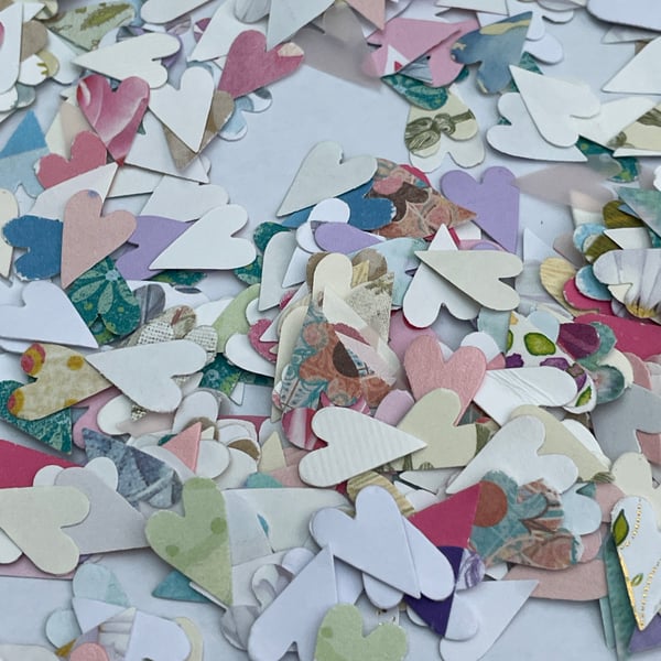 Hand punched paper hearts pretty summer colours table confetti