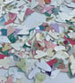 Hand punched paper hearts pretty summer colours table confetti