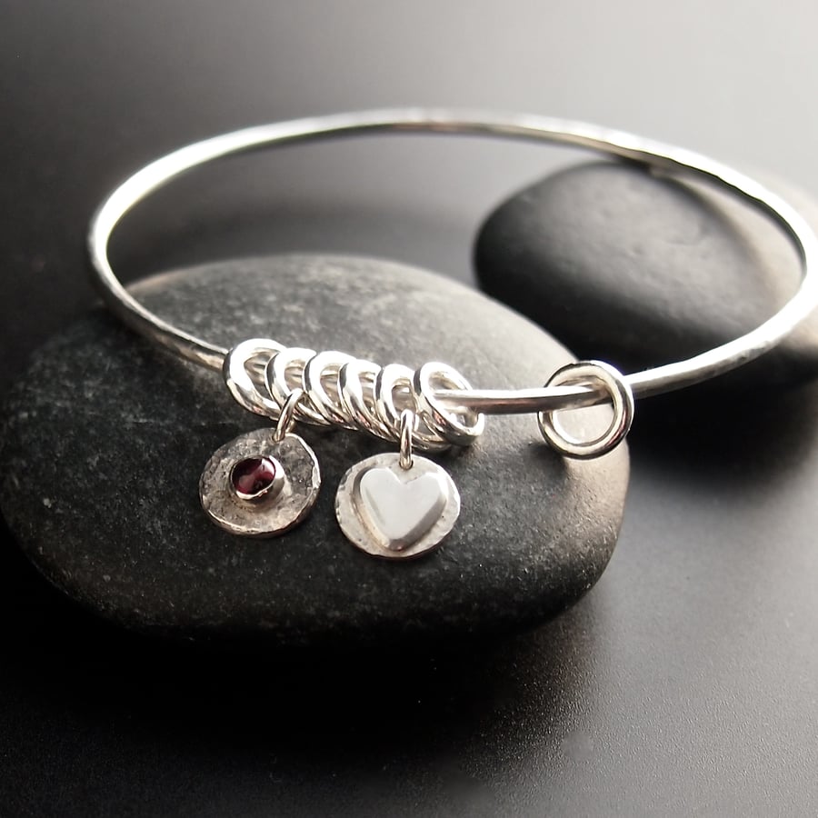 Sterling Silver Bangle with Heart Charms and Garnet
