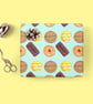 Biscuit wrapping paper with jammy dodger, bourbon and digestive biscuits