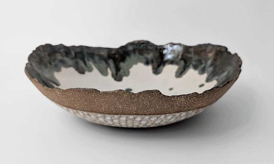 Coiled and carved low dish