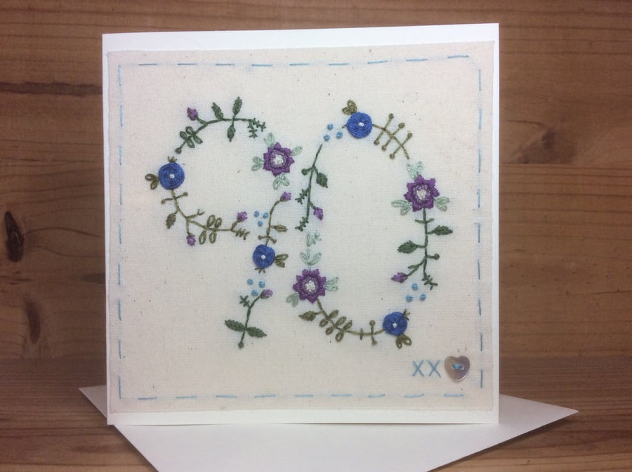 Floral hand embroidered age card