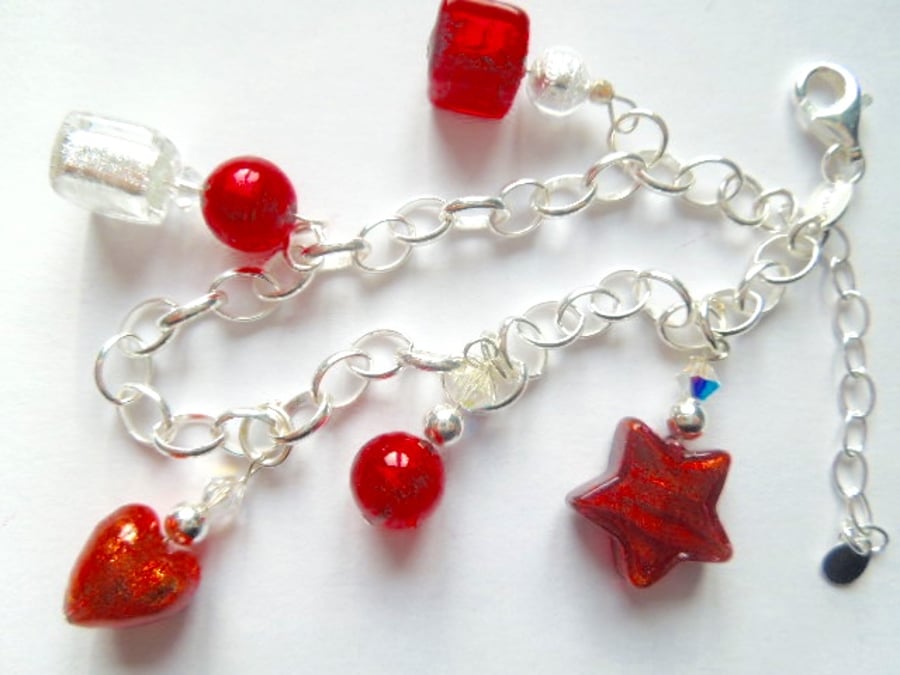 Sterling silver and red Murano glass charm bracelet with Swarovski crystal.