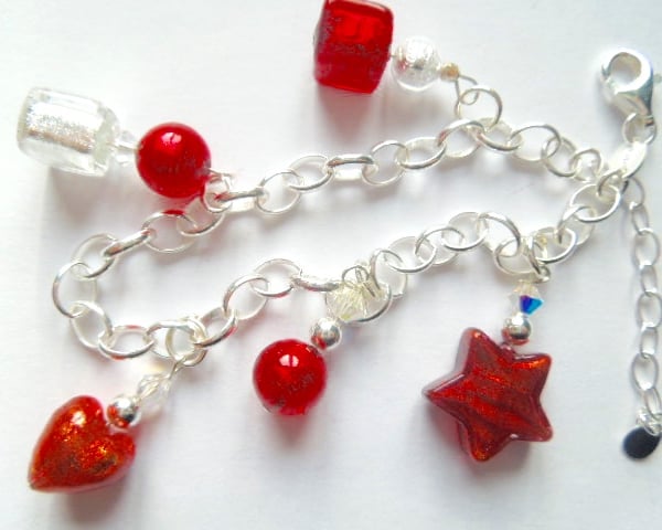 Sterling silver and red Murano glass charm bracelet with Swarovski crystal.