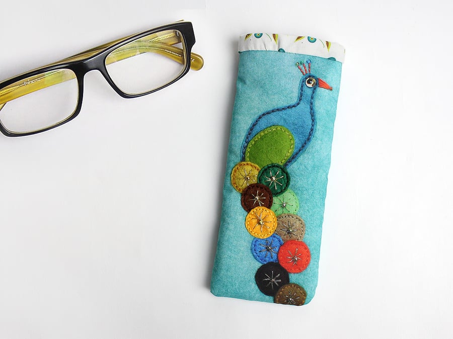 Turquoise glasses case with "stitchograph" peacock design
