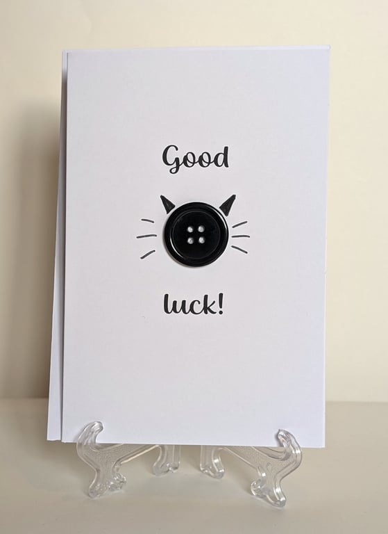 Good luck black cat button greetings card 