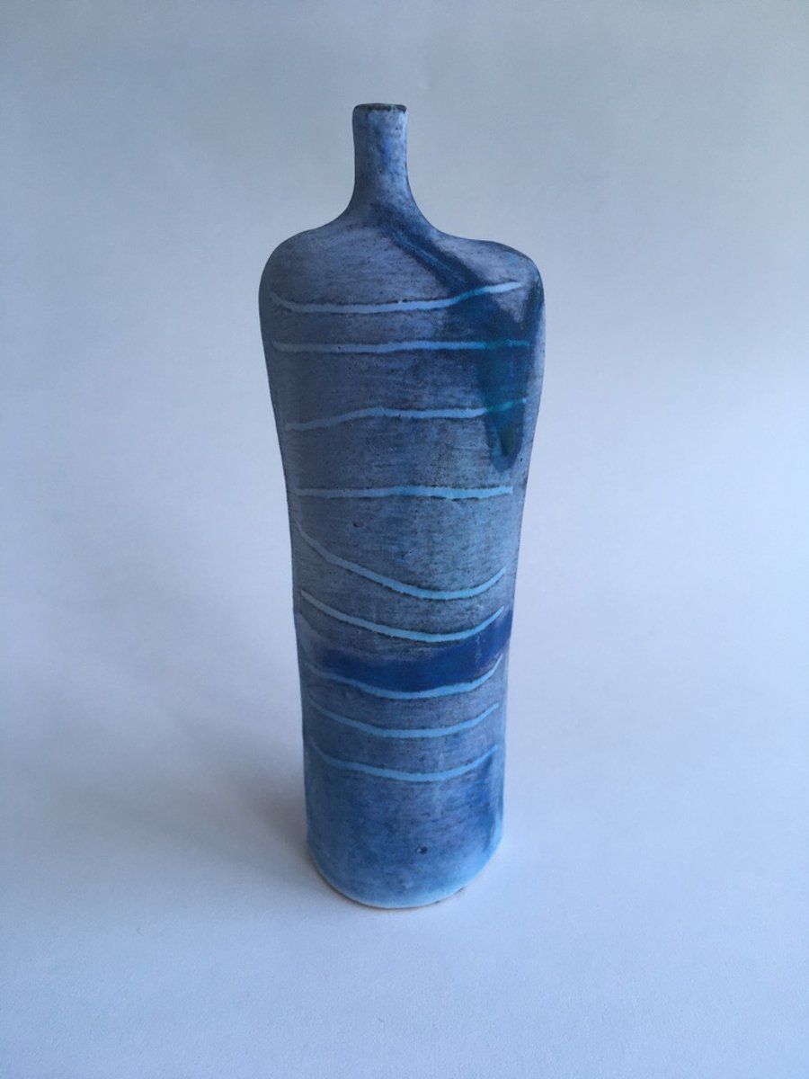 Tracks Bottle Slip Decorated onto Stoneware Ceramic