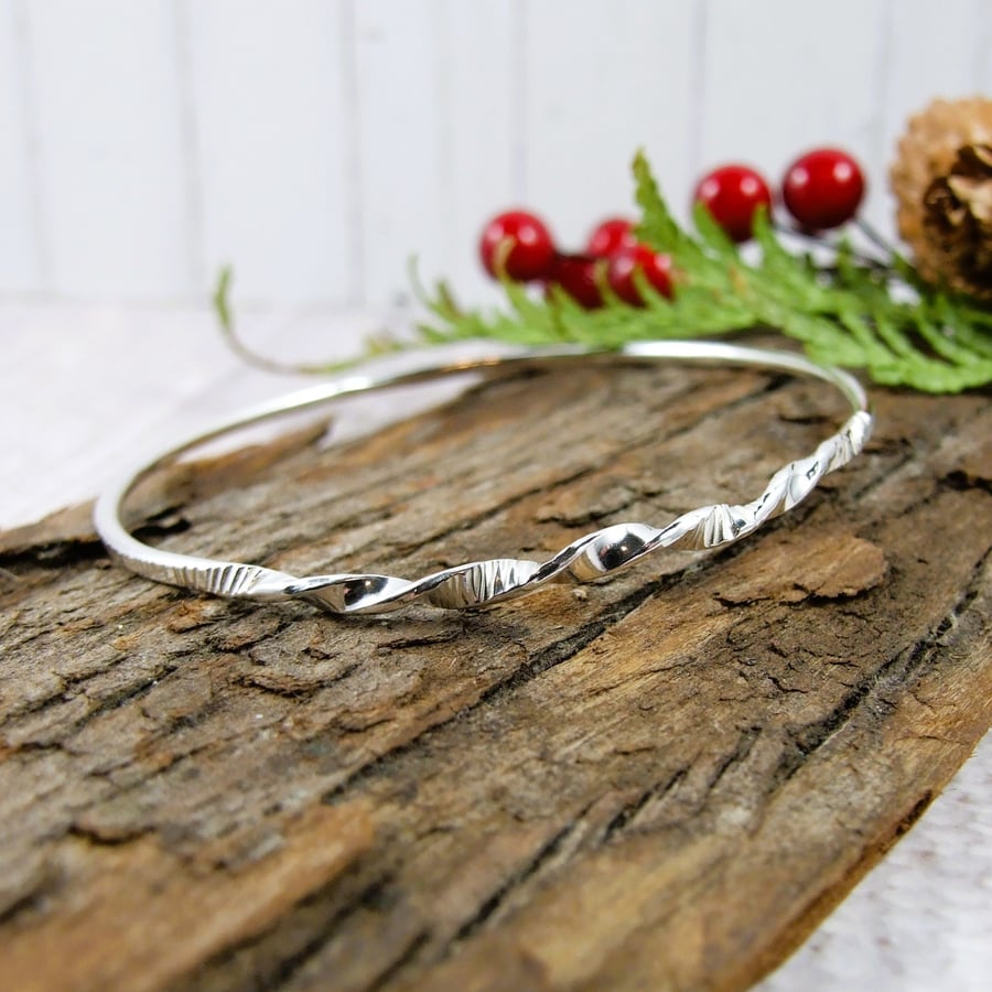 Sterling Silver Bangle with Twist and Line Texture Detail. Size Small 19cm 