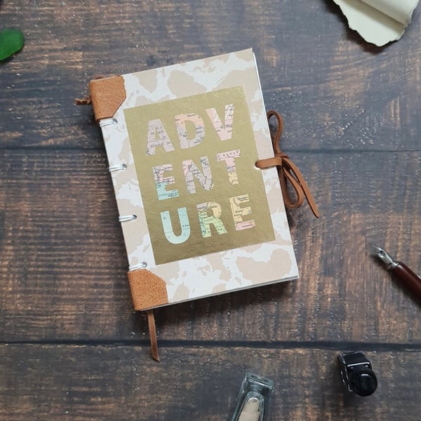 Handmade A6 travel journal, Coptic stitching and leather details 