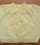 Handknitted yellow baby cardigan, approx 0-3 months, to fit a 16" chest