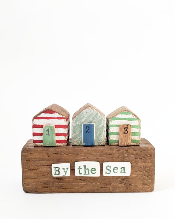 Little Painted Wooden Beach Huts 'By the Sea'