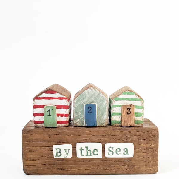 Little Painted Wooden Beach Huts 'By the Sea'