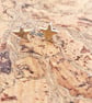 Gold star stud earrings - Image 1