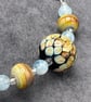Raku spotted lampwork glass beaded necklace cream brown blue caramel - Image 4