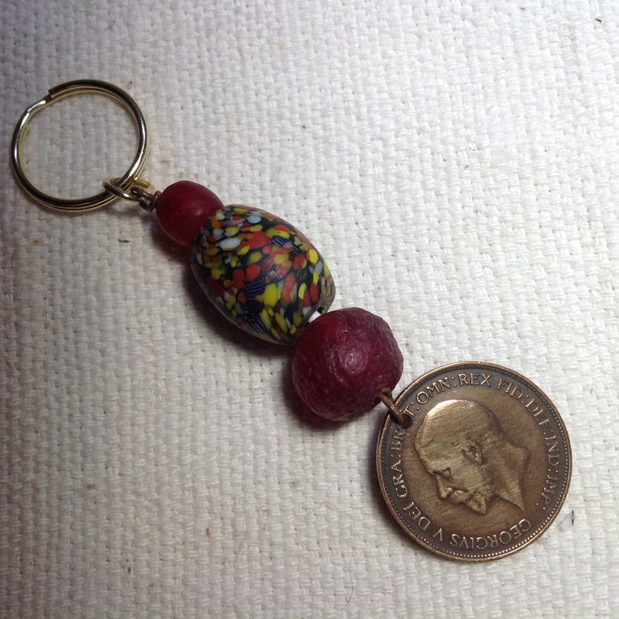Keyring with 1932 penny and African glass beads