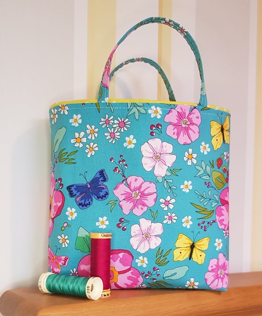 Reusable fabricgGift bag, floral design on turquoise 