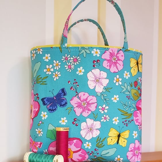 Reusable fabricgGift bag, floral design on turquoise 