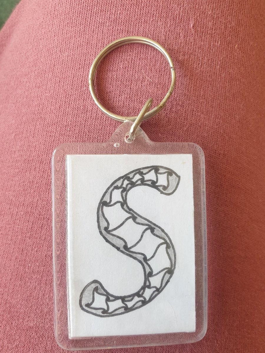 Hand drawn initial "S" keyring.