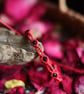 Macrame protection bracelet with Black Tourmaline in red - Image 1