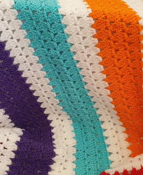 Handmade bright colours granny stitch baby blanket