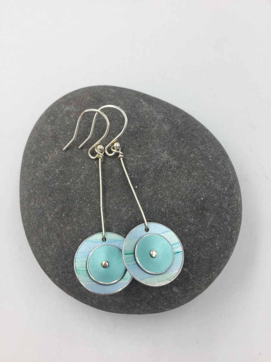 Anodised aluminium daisy chain earrings in shades of green