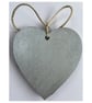 A heart shaped mosaic pendant with a sylised brown and red birds' feet theme. - Image 2