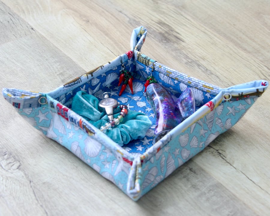 Quilted Fabric storage box with seashells on light and dark blue fabric