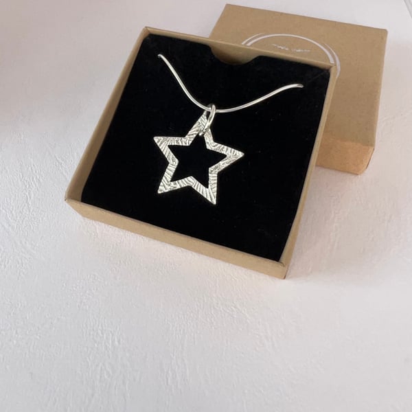 Silver star shape pendant necklace