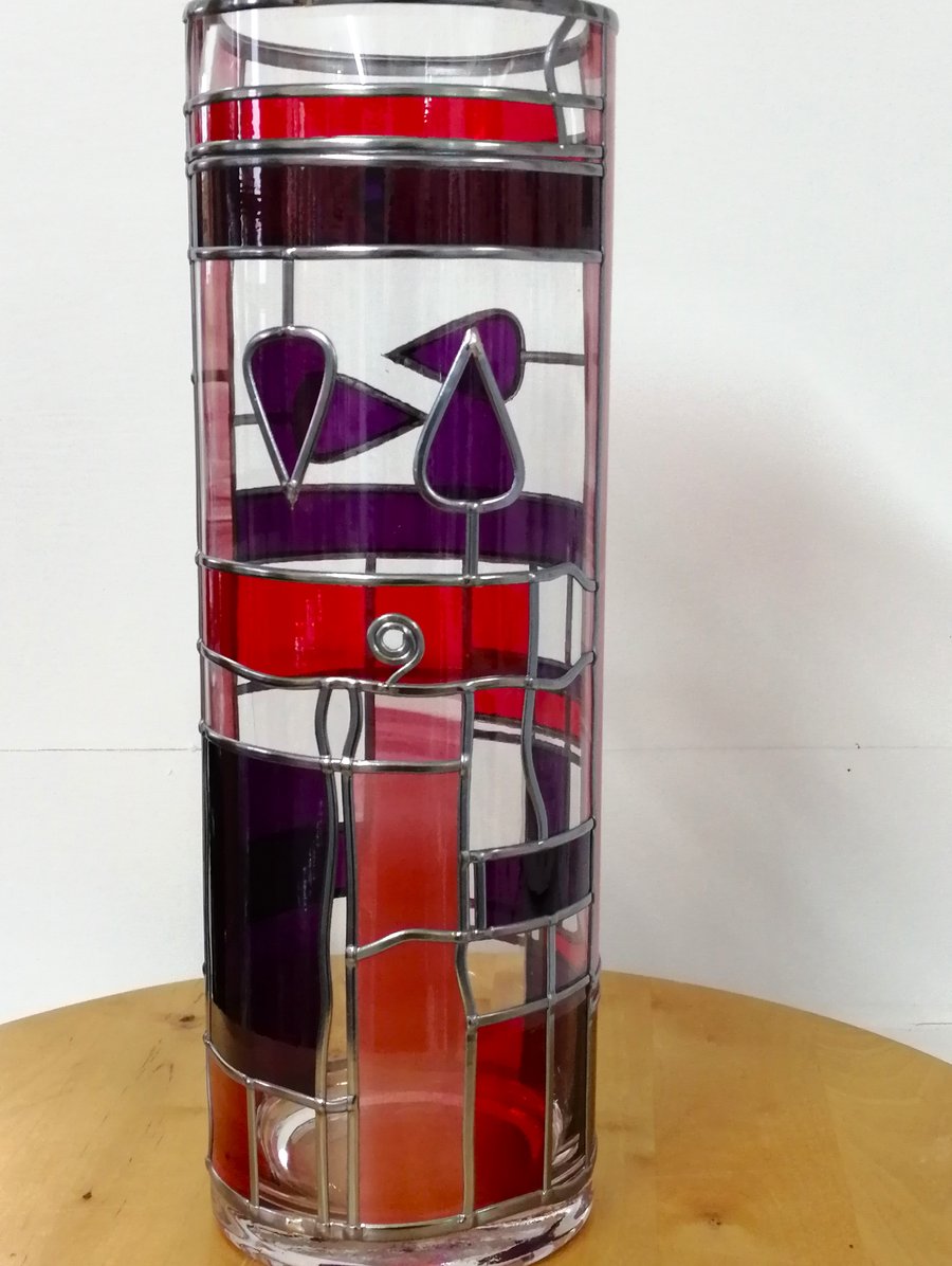 Mirabelles is a Art Deco style  30cm tall round stained glass effect flower vase