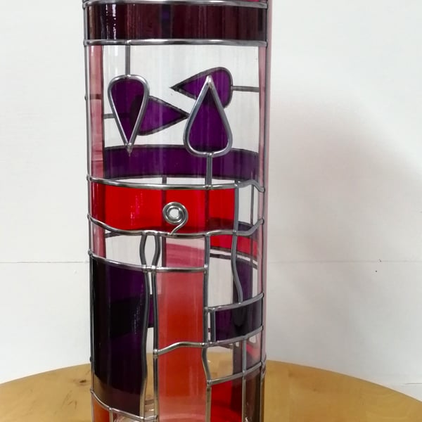 Mirabelles is a Art Deco style  30cm tall round stained glass effect flower vase