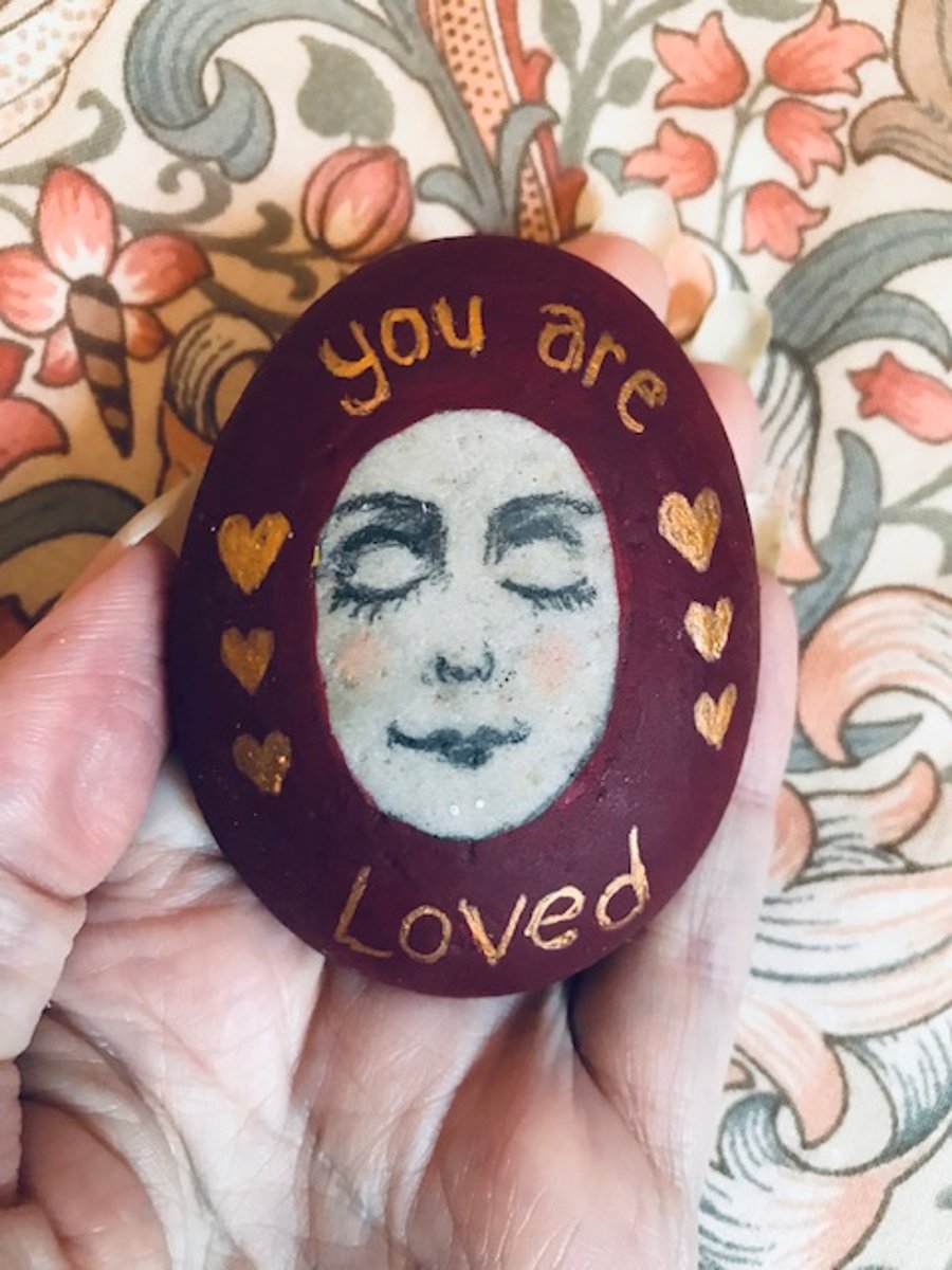 Painted stone "You are loved"