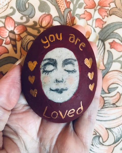 Painted stone "You are loved"
