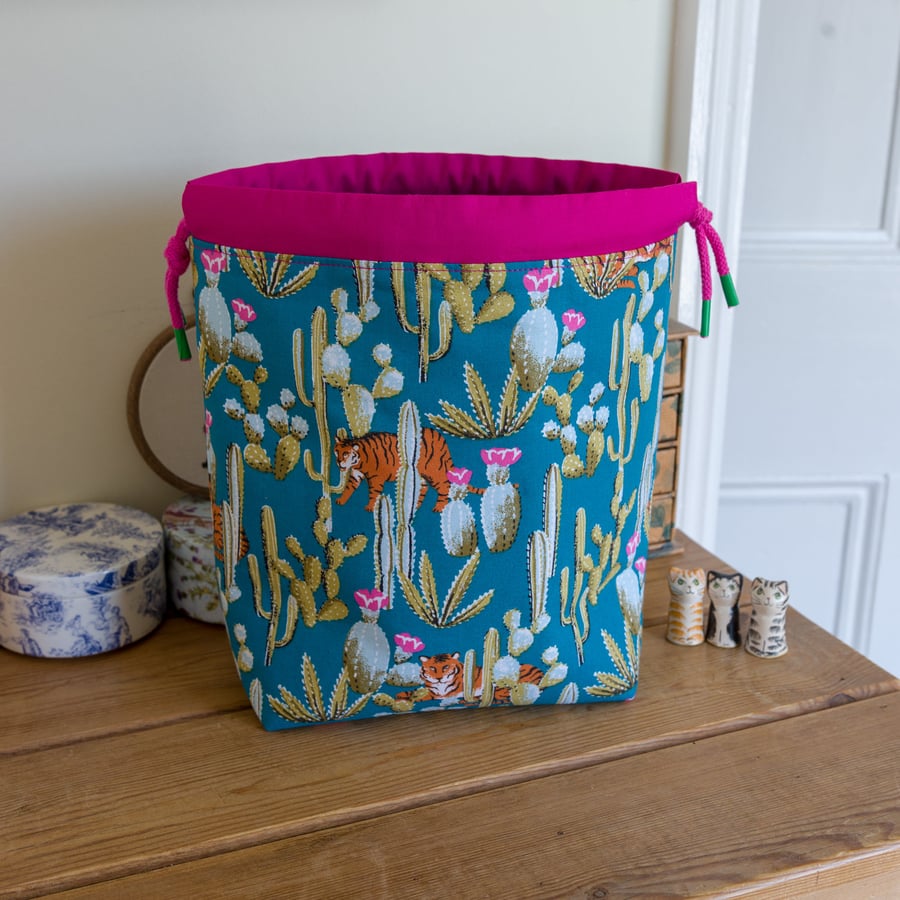 Reversible drawstring project bag made with tiger and leopard prints