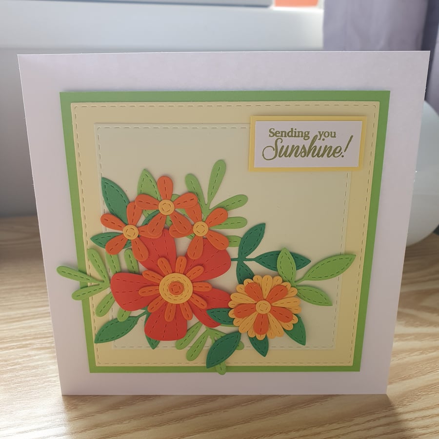 A floral die cut birthday card for a woman