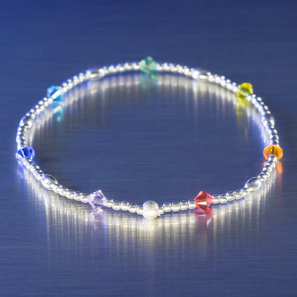 Sterling silver and Swarovski stretch bracelet in rainbow chakra colours