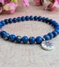 Blue sea sediment jasper stretch bracelet with North Star charm - Image 1