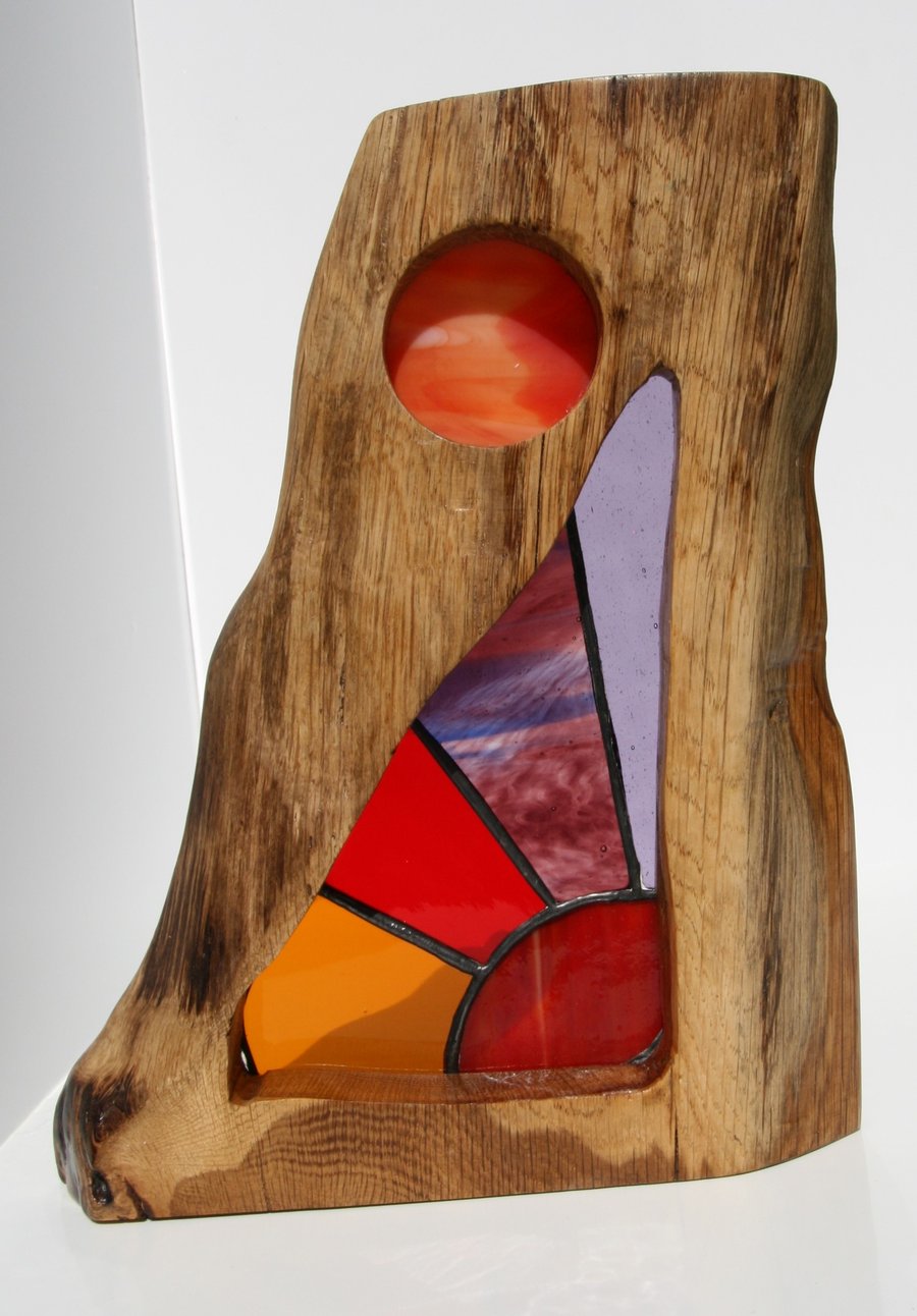 ‘Harvest Moon’ stained glass suncatcher framed with solid oak.