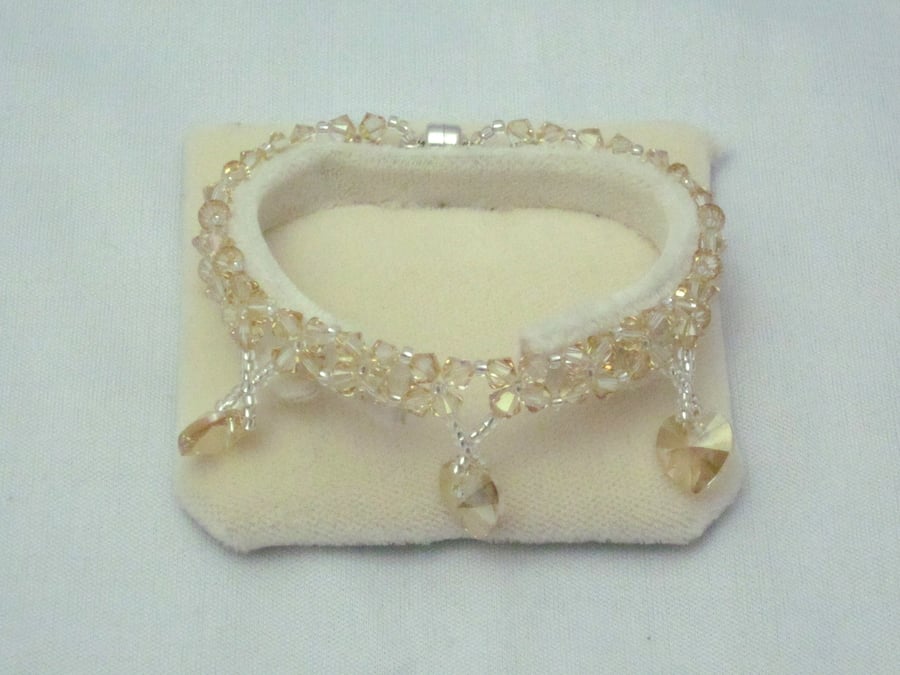 Swarovski golden shadow crystal bracelet with heart charms (414)