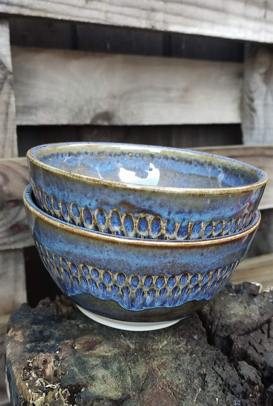 Small to medium blue & brown bowl with carved pattern