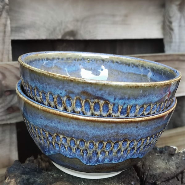 Small to medium blue & brown bowl with carved pattern