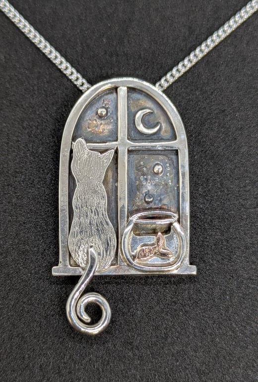 Sterling silver window pendant with cat and goldfish bowl with a red gold fish