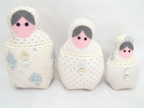 pale green graduated russian matryoshka nesting display art dolls