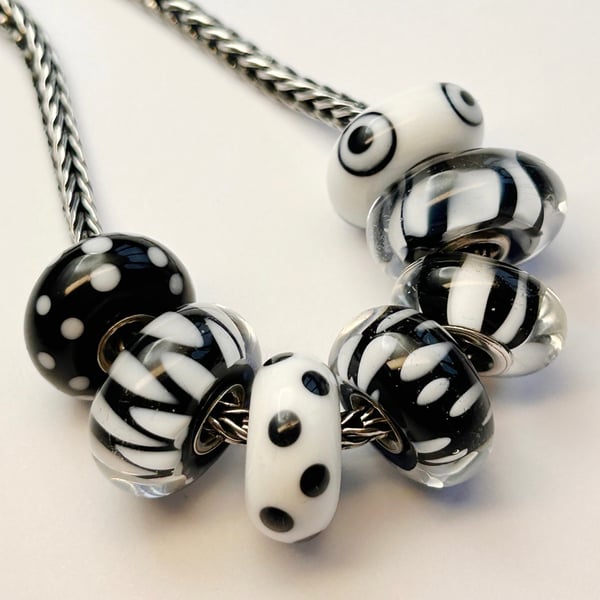 Handmade black and white, silver cored, big hole lamp work glass beads (PandoraT