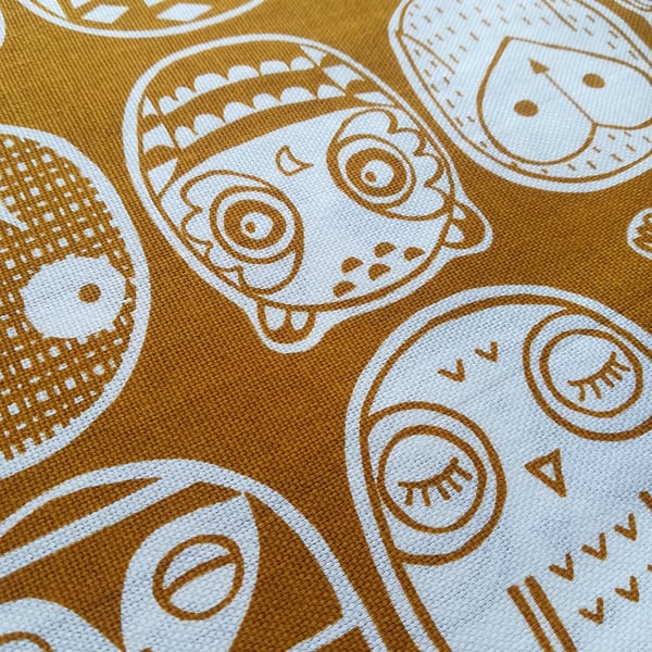 'Owls' mustard tea towel