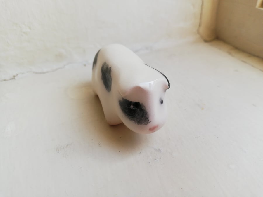 Handmade ceramic guinea pig figure in black and white 4 pocket pet lover