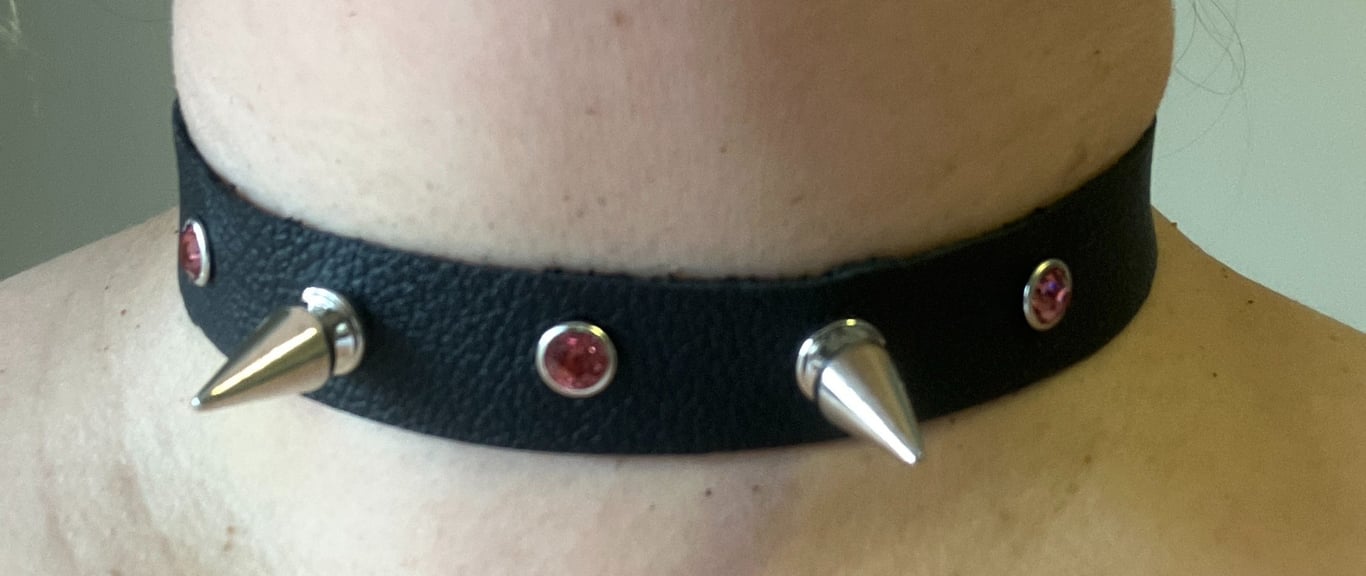 Black leather choker with 2 Spikes and 3 Pink Gemstones