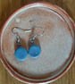 Ceramic disc dangle earrings in blue