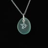 Beach glass pendant with dove charm